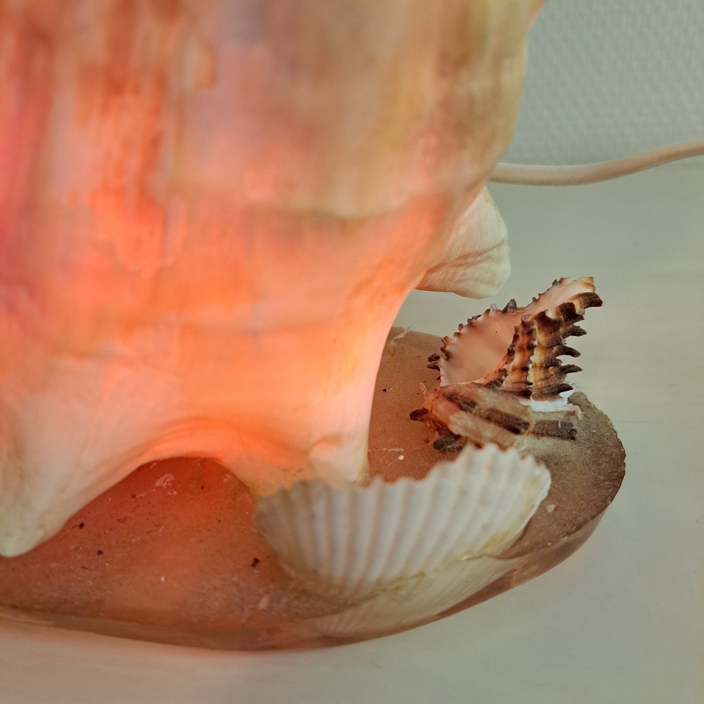 Simpukka pöytävalaisin