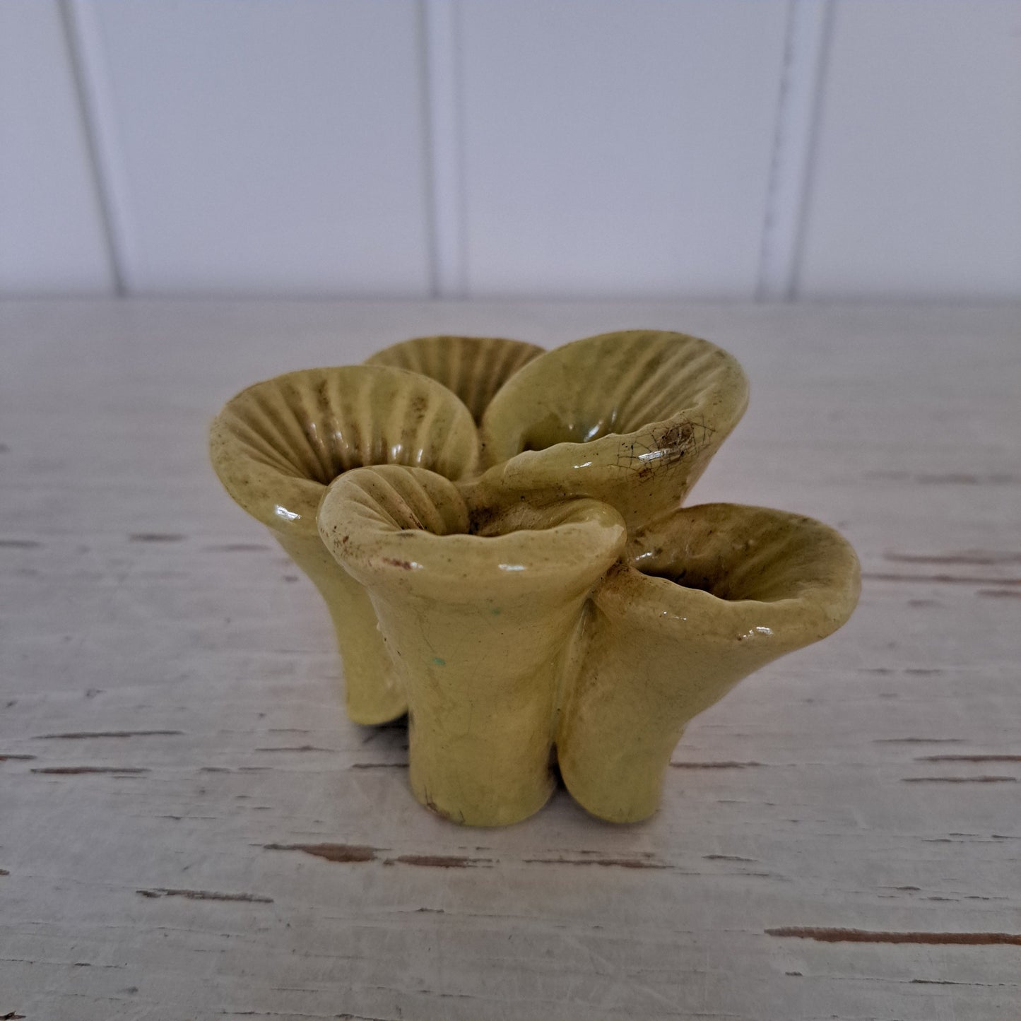 Kupittaan savi, kukkapidike